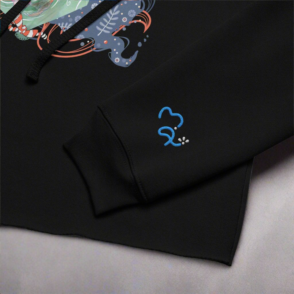 Close up of the embroidery on the left wrist: brand name "Mai" from Maiasa Mai Illustrations. Embroidery in blue and white color.