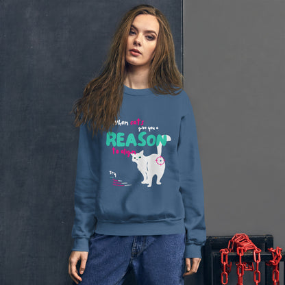 Woman wearing a crew Neck sweatshirt in indigo blue color, for cat lovers and nerd developers, featuring a cat showing his butt, with the inscription "When cats give you a reason to align" and some line codes.