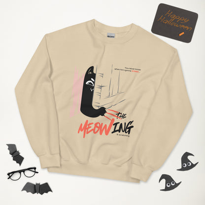 Sand crew neck sweatshirt with illustration of a cat trying to break into a door. Parody of the Shining, this design is called "The Meowing & scratching" because you never know when he's gonna strike. This version shows a mischievous cat scratching the floor in an attempt to enter the room.