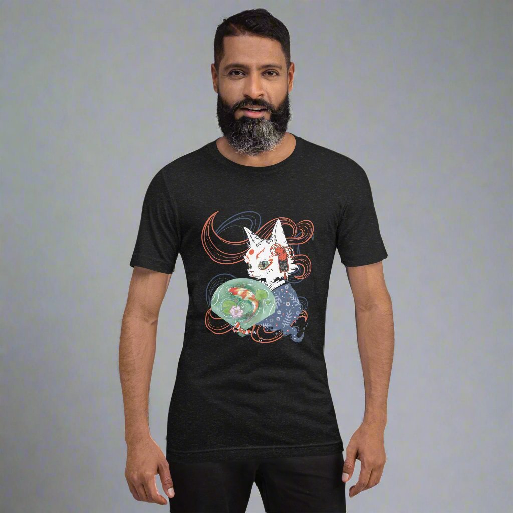Man wearing a black T-shirt with a digital illustration of a folklore Japanese cat monster Bakeneko, dressed in a blue patterned kimono. The fan its holding has a koi fish swimming in a pond. Colored waves are displayed on the dark background.